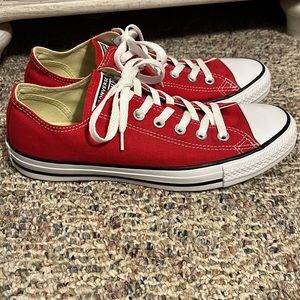 Converse red low top shoes